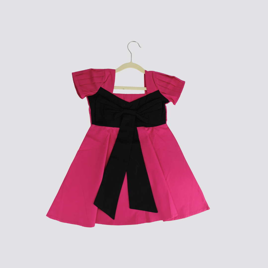 Vibrant Pink Dress with Black Bow Accent
