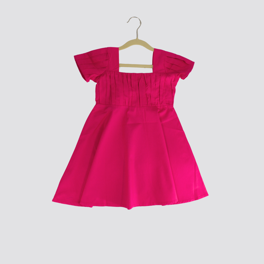 Vibrant Pink Dress with Black Bow Accent