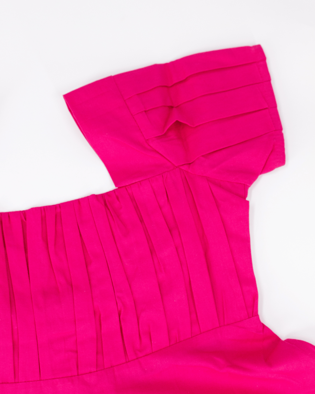 Vibrant Pink Dress with Black Bow Accent