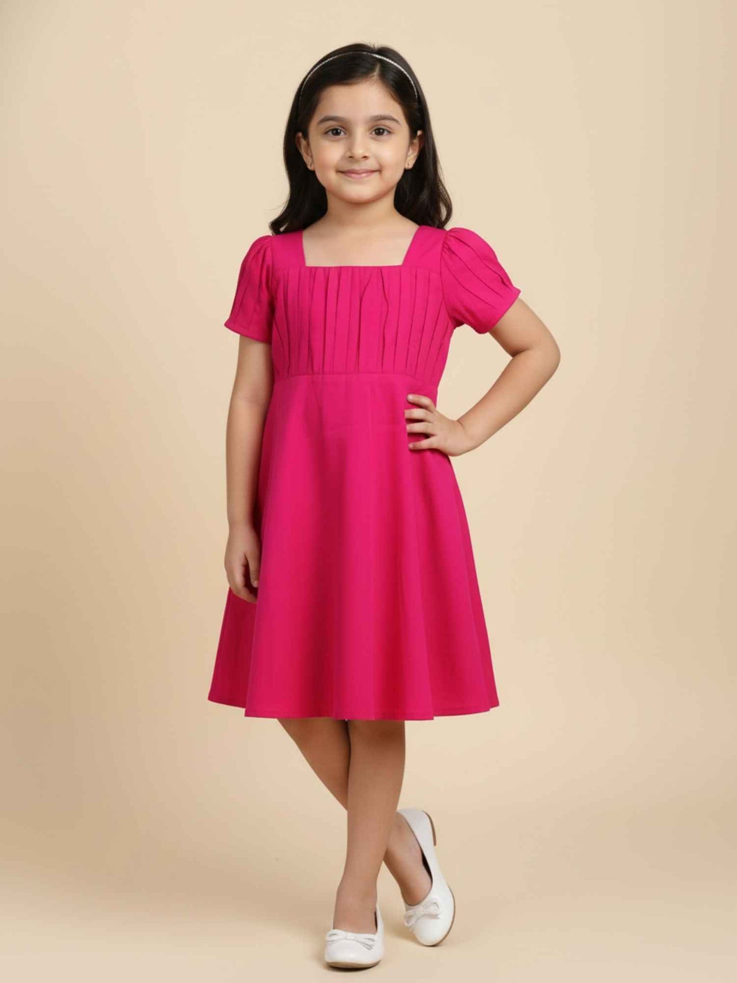 Vibrant Pink Dress with Black Bow Accent