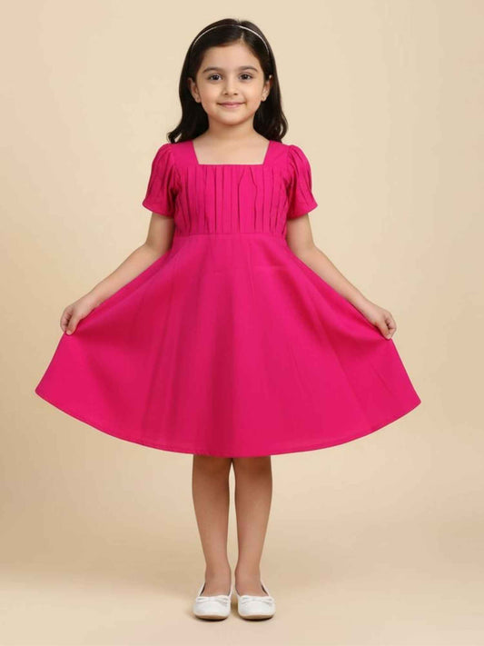 Vibrant Pink Dress with Black Bow Accent